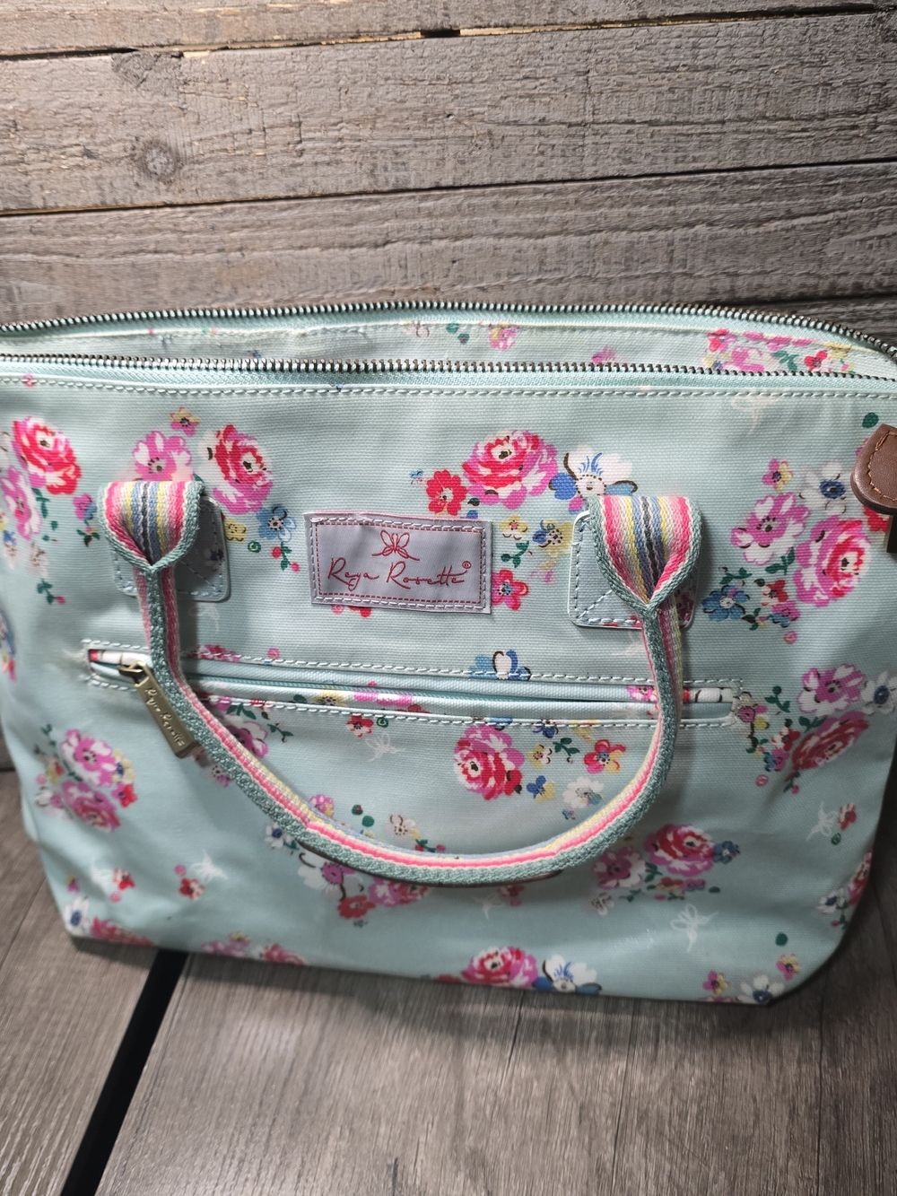 Light blue floral canvas shoulder bag by Reya Rosette.